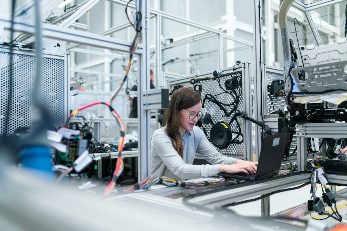 Engineer configuring equipment on site during a deployment